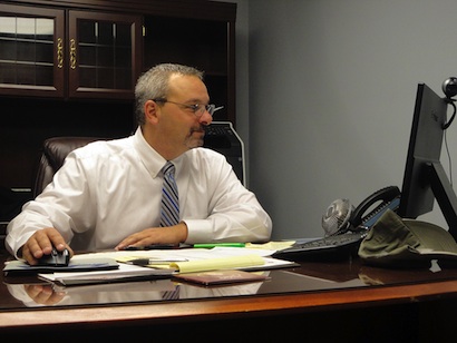 Chief White reviewing patrol schedule