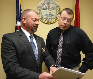 Sheriff Tommy Jones with Detective Doug Mills