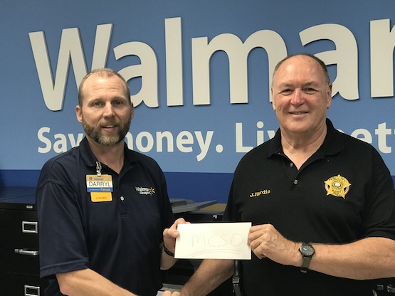 Left to Right - Walmart Store Manager Darryl Lyons and Auxiliary Captain James Hardin
